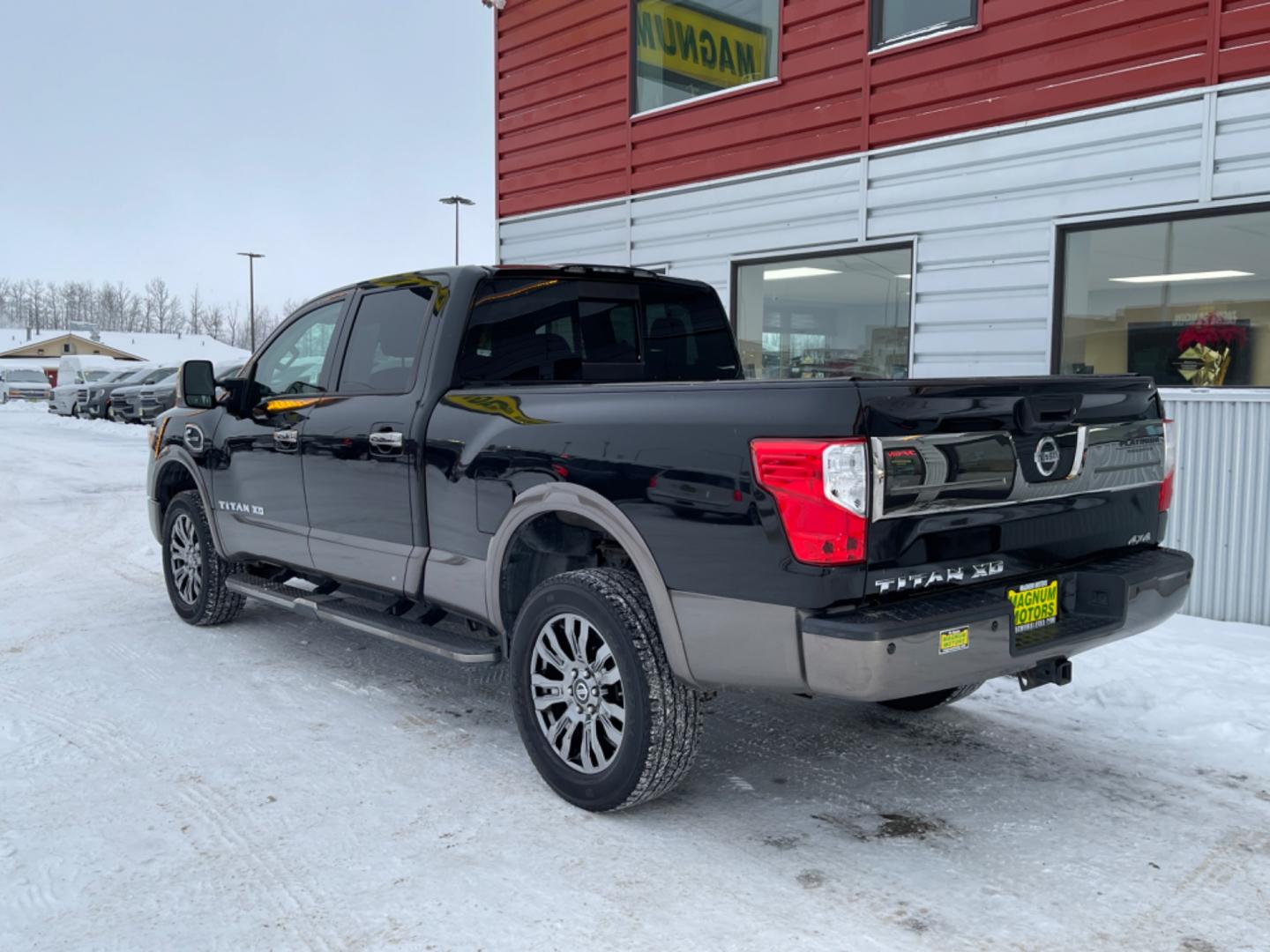 2016 Black /black leather Nissan Titan XD PLATINUM RESERVE 4WD (1N6BA1F46GN) with an 5.0L V8 DOHC 32V DIESEL engine, 6A transmission, located at 1960 Industrial Drive, Wasilla, 99654, (907) 274-2277, 61.573475, -149.400146 - Photo#2